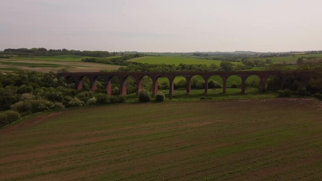 An aerial view of the Ledbury Viaduct bridge in England during daylight