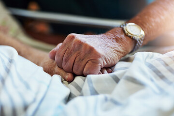 Senior person, holding hands and visit with hospital, closeup and elderly care or love together....