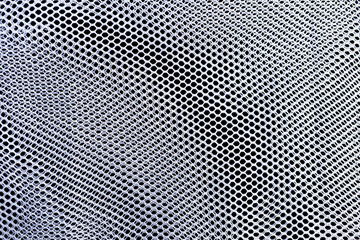 White net on black fabric background, blue net texture background