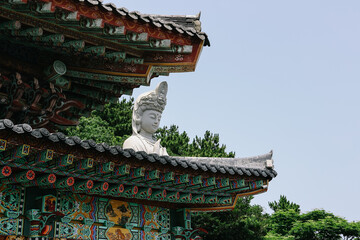 Jeju Island, South Korea - July 12, 2022: Sanbanggulsa Temple located at the foot of the Sanbangsan mountain where a Buddha statue is enshrined.