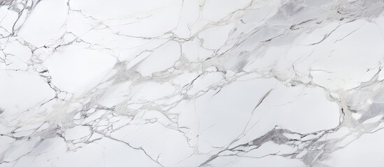 A white marble texture pattern background with a close up view providing ample copy space for insertion of other images or text