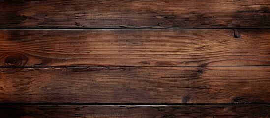 Obraz premium A background image with a textured dark brown wood pattern perfect for showcasing copies or placing text over. with copy space image. Place for adding text or design