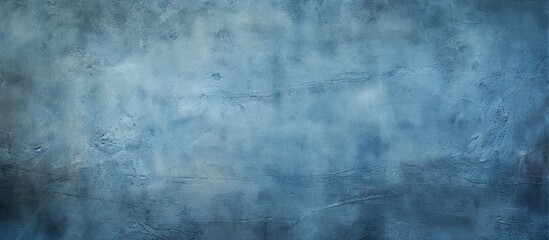 Fototapeta na wymiar A textured background with a blue cement and concrete design featuring a vignette effect The background offers ample room for text or images