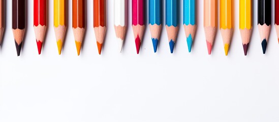 A white background showcases a top down view of 12 pencils providing ample copy space for text