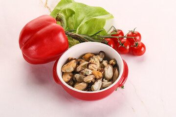 Marinated mussels in the bowl