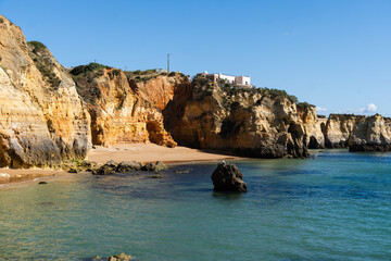 Portugal landscape. Atlantic coast landscape in Algarve region. Praia do Pinhao sandy beach
