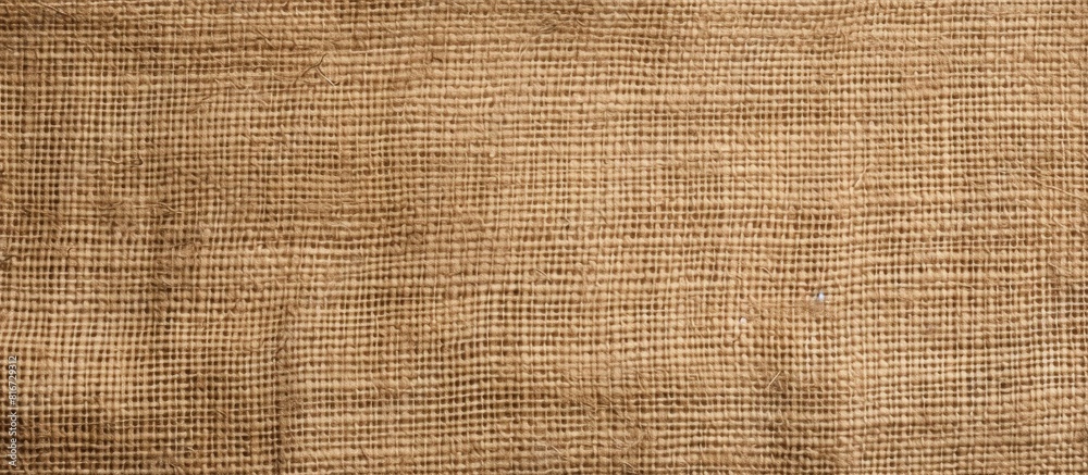 Aufkleber Top view of a burlap linen fabric surface resembling the texture of a hessian sack creating a textured background for a copy space image