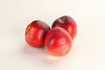 Ripe sweet juicy nectarines heap