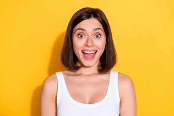 Photo portrait of attractive young girl excited face wear trendy white outfit isolated on yellow color background