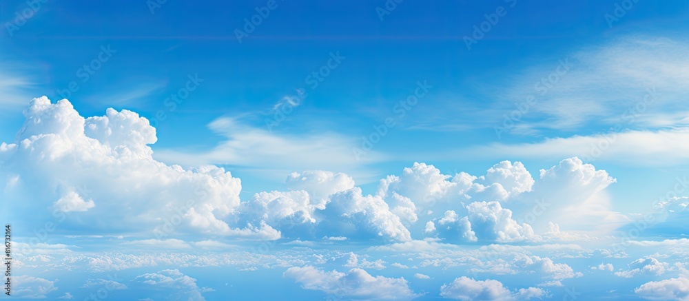 Poster a scenic outdoor skyline with a vivid cyan cloudscape creating a natural background of blue sky and 