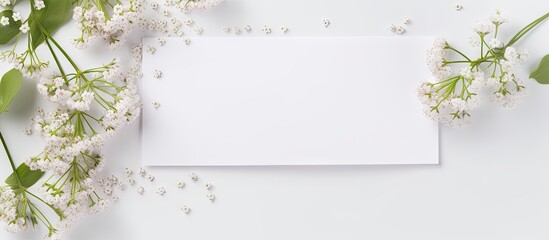 A white envelope with Gypsophila flowers on a white background creating a mockup suitable for greeting cards on occasions like Women s Day and Mother s Day. with copy space image - Powered by Adobe