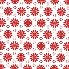 Vivid close-up shot of an array of red flowers set against a stark white background