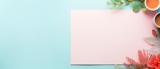 Obraz premium Studio photo with a creative layout for text on a pastel colored paper featuring a copy space image