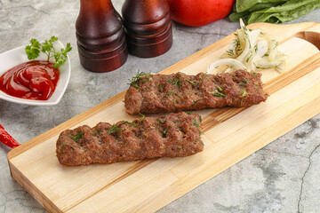 Kebab with beef served onion