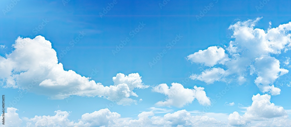 Poster a serene and unobstructed scenery of a blue sky providing ample empty space for additional content