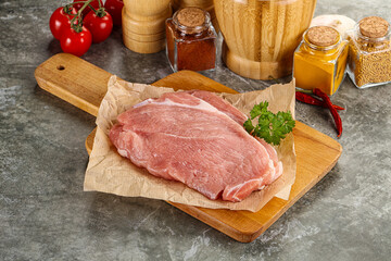 Raw pork schnitzel for cooking