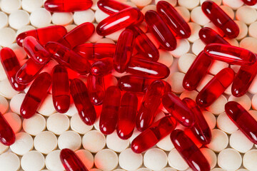 Many colorful pills top viev. Set of many pills on colored background