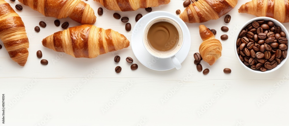 Aufkleber A top down view of a white background showcasing a delightful morning spread of aromatic coffee and sweet croissants with plenty of copy space