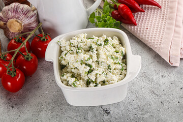 Curd cheese with green herbs