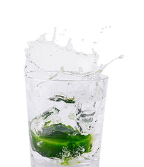 Fresh splash with lime in glass of water
