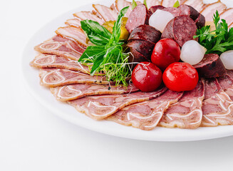 Assorted deli meat platter on white background