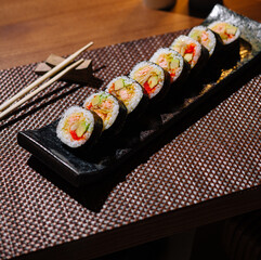 Sushi platter presentation on elegant dining table