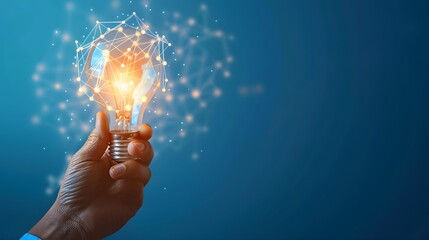 A hand holds a glowing light bulb, with connected dots on a blue background, symbolizing ideas and innovation