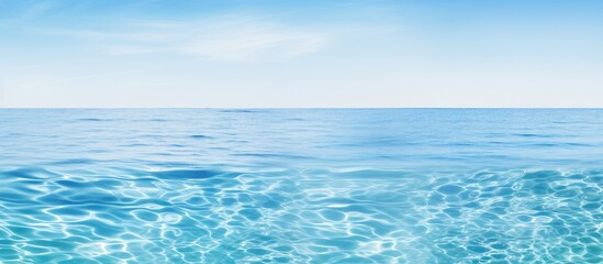 Fototapeta premium A copy space image of a tranquil blue and white pool water background or an ocean water background
