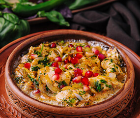 Savory shrimp hummus plate with pomegranate