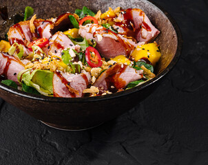 Delectable bacon tataki salad in rustic bowl