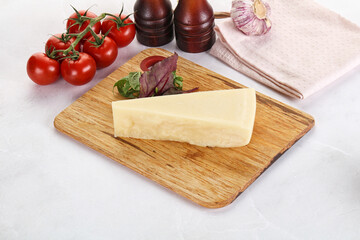 Piece Italian hard parmesan cheese