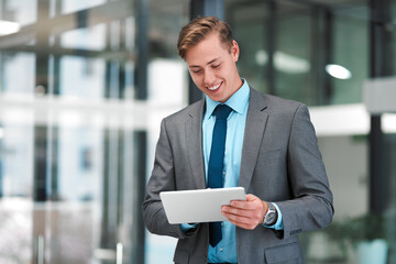 Businessman, tablet and happy for communication, email and research in modern office. Trader,...