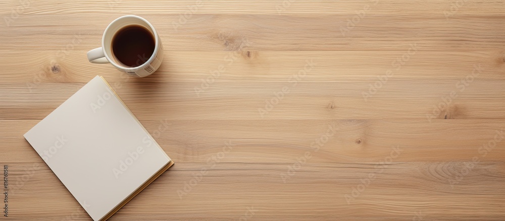 Aufkleber A top down view of a light wooden table with a blank open notebook school supplies and room to add text or images. copy space available
