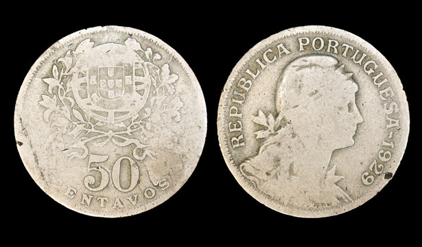 Closeup of a Portuguese fifty centavos coin on a solid black background.