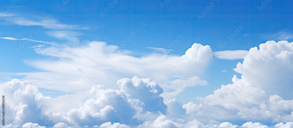 Poster the alternating blue sky and white clouds can serve as the background image. copy space available