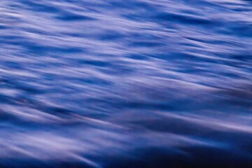 Vibrant shot of a wave in the ocean, beautiful background