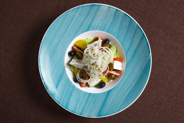 Fresh Greek Salad with Feta Cheese, Tomatoes, Cucumbers, and Olives