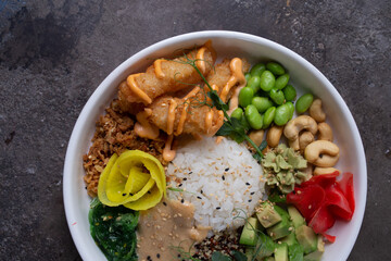 top view Wholesome and colorful poke bowl with fresh ingredients.