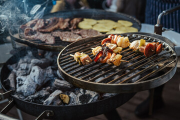 Closeup of skewers on a grill