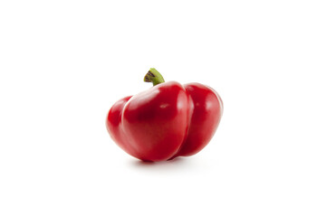 Whole red bell pepper isolated on white background with clipping path. .