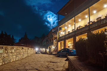 Sights of Armenia. Dilijan in evening. Ancient architecture of south caucasus. Two-story building...