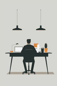 Minimalist image of a man working on a computer at his desk