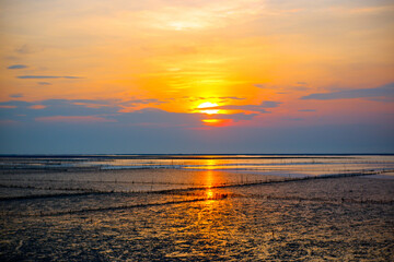 Beautiful sunrise over the horizon. Aerial photography. sunrise in the ocean. Beautiful seascape and sun on orange sky background , landscape Thailand.