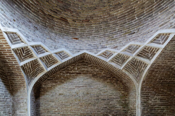 Bukhara, historical bath (hammam). Brick vault ceiling, showcasing intricate geometric patterns,...