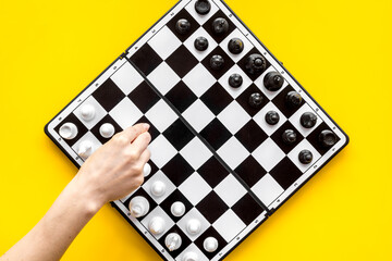 Chessboard with chess pieces, top view. Challenge and leadership concept