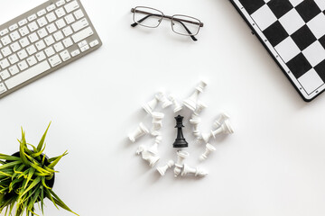 Challenge and leadership concept. Chess board on office table, top view
