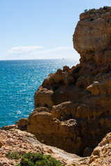 Algar Seco in Carvoeiro. Beautiful Golden Sandstone Rock Formation in Algarve with Atlantic Ocean...