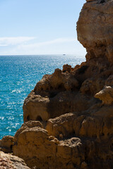 Algar Seco in Carvoeiro. Beautiful Golden Sandstone Rock Formation in Algarve with Atlantic Ocean...