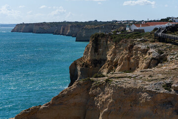 Algar Seco in Carvoeiro. Beautiful Golden Sandstone Rock Formation in Algarve with Atlantic Ocean...