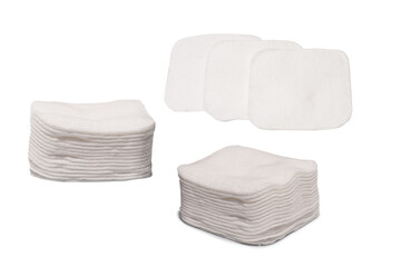 Stack of white cotton sponges isolated on a white background.